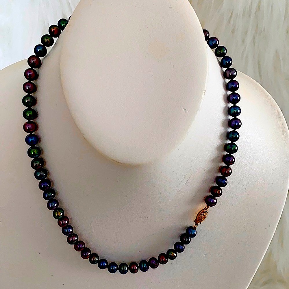 7mm genuine fresh water pearls in black 16” & 14k solid Gold closure.